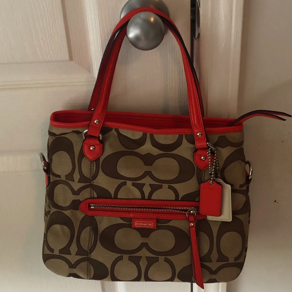 Orange and tan coach purse